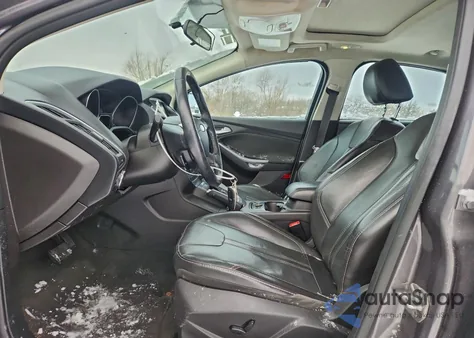 2014 Ford Focus Titanium from USA, damaged, VIN 1FADP3N22EL291234